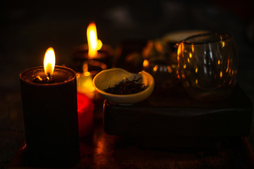 tea ceremony with burning candles 