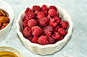 colorful raspberries in a bowl, healthy berry