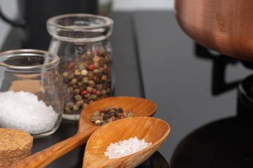 Metal pot on a gas stove burner at home kitchen close up