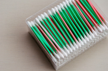 Set of cotton buds in a rectangular box.