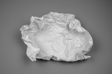 Fototapeta premium white and gray wide crumpled paper texture background. crush paper so that it becomes creased and wrinkled.