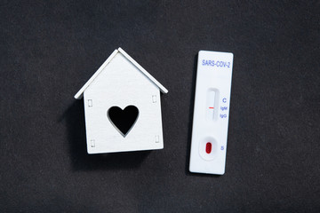 Positive test on a black background. Stay home concept.