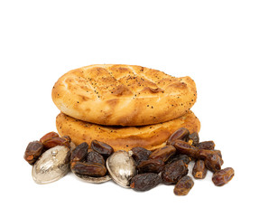 Isolated on white background, top view, palm fruit in the bread and bowls named  Pide produced by Muslims specially for the holy month of Ramadan.