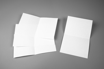 Blank portrait mock-up paper. brochure magazine isolated on gray, changeable background / white paper isolated on gray