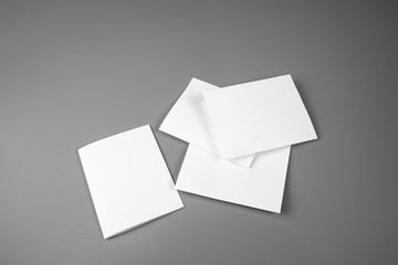 Blank portrait mock-up paper. brochure magazine isolated on gray, changeable background / white paper isolated on gray