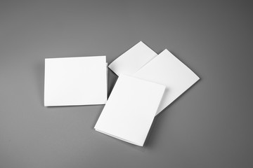 Blank portrait mock-up paper. brochure magazine isolated on gray, changeable background / white paper isolated on gray