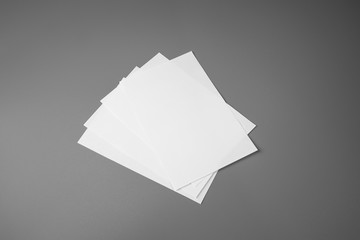 Blank portrait mock-up paper. brochure magazine isolated on gray, changeable background / white paper isolated on gray