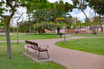 Bionite urban park with trees, grass, lake banks source.