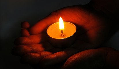 Hand holding a candle, Candle Light, Beautiful Candle in Hand. hand with a candle. 