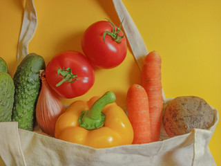 Vegetable set in a textile bag. Copy space for text