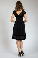 Fototapeta premium beautiful girl posing in black dress