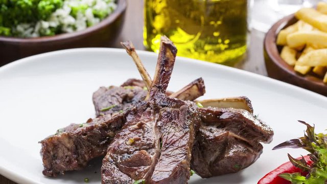 lamb rack barbecue served with side dishes