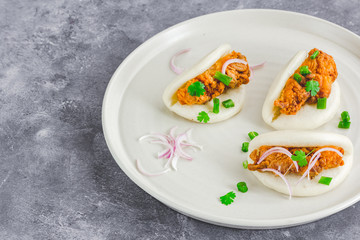 Steamed Bao Buns with Cilantro, Chinese and Taiwanese Street Food, Horizontal Asian Street Food Photo.