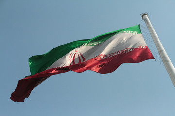 Iranian Flag Waving on a Windy Afternoon in Teheran