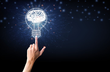 Light bulb with brain, finger of person touching on light bulb and point connecting network on blue...
