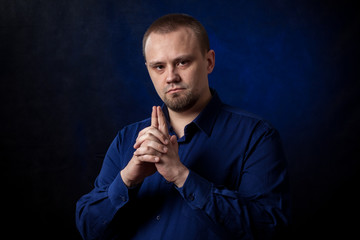 a young man businessman on a plain background.