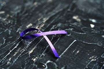 Purple ribbon-symbol of the fight against domestic violence