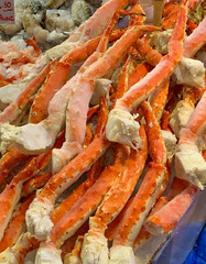 A display of crab legs for sale at market