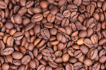 Roasted coffee beans as background, close-up, macro coffee bean, top view, high resolution