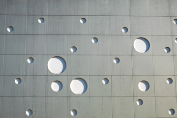 Background texture. wall with round holes in the form of gas bubbles.
