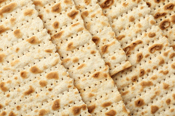 Traditional Matzos as background, top view. Pesach (Passover) celebration