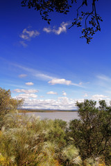 Obraz premium reservoir sun and clouds