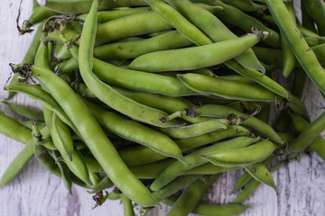 Fresh  broad beans in the pod close up