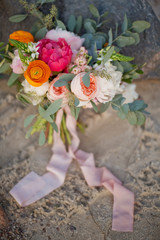 Wedding bouquet with peony, ranunculus, rose