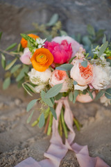 Wedding bouquet with peony, ranunculus, rose