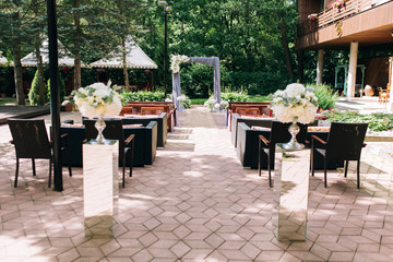 wedding ceremony chairs flowers boho style