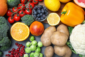 Different products rich in vitamin C on table, flat lay