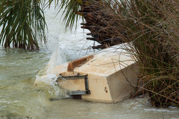 Capsized row boat on beach