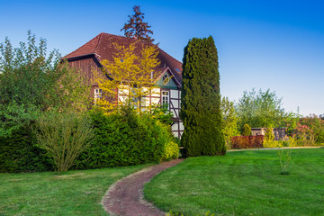 Fototapeta na wymiar Stately country house with garden park, Germany