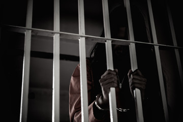 Hands of women desperate to catch the iron prison,prisoner concept,thailand people,Hope to be...