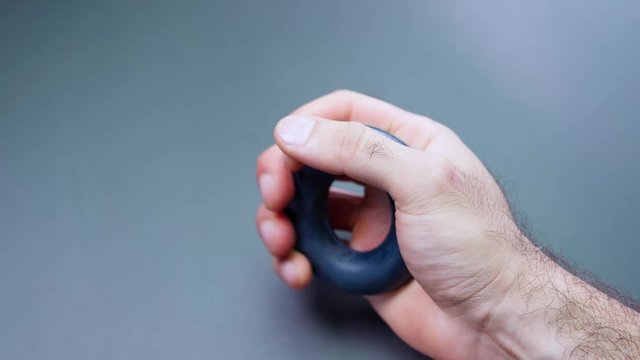 Exercise. Hand squeezing the espander