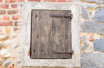 Original medieval wooden door; photo taken in Italy
