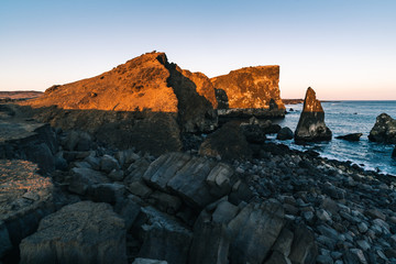 Marvelous sunset on popular tourist attraction Valahnukamol bay in southern Iceland. Cliffs are located in Reykjanes peninsula and are easily accessible from Keflavik or Reykjavik the capital city
