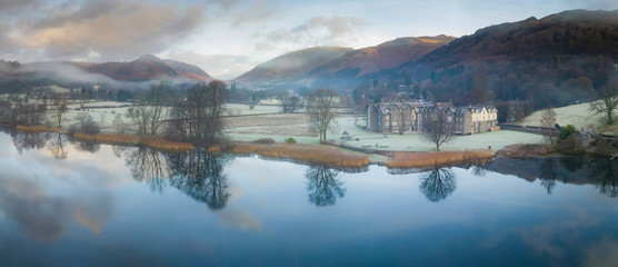 The English Lake District- aerial panorama of Grasmere during winter early morning cloud inversion