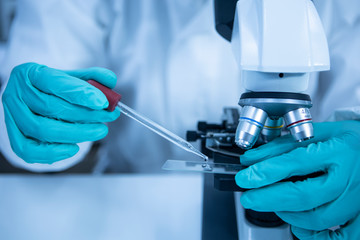 science laboratory test with a microscope , laboratory equipment.