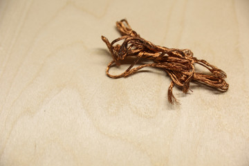 twisted copper wire background. copper scrap close up
