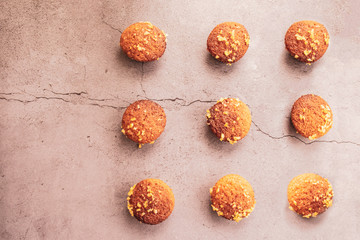 nine homemade fruitcakes are spread out on the table