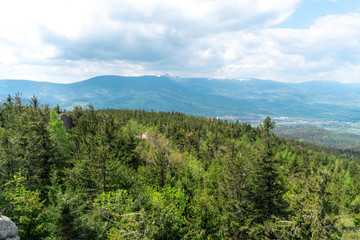 Fototapeta na wymiar Panoramic view of the mountains and forests from the 
