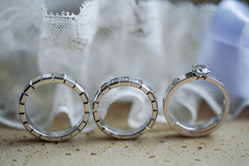 Jeweller ornament. White gold wedding rings