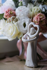 Jeweller ornament. White gold wedding rings