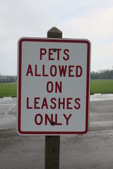 Pets Allowed On Leashes Only Sign