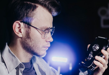  male computer technician holds a hard drive. computer storage drive.