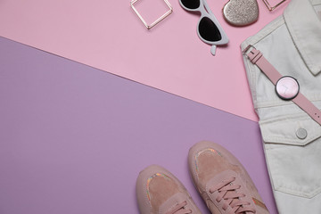 Flat lay composition with stylish clothes and accessories on color background. Space for text