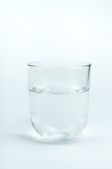 glass of clean water isolated on white.