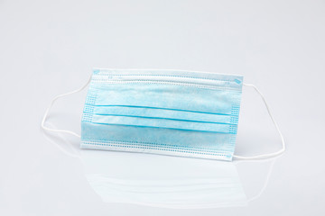 blue surgical mask isolated on a white background