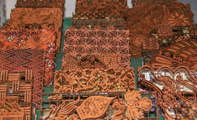 Wax copper stamps at Batik factory in Jogja